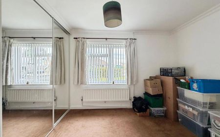 A spacious and beautifully presented three double bedroom semi-detached bungalow, featuring open-plan living, a master en-suite, lovely views from upstairs, and a private garden, along with garage and off-road parking. - Photo 3