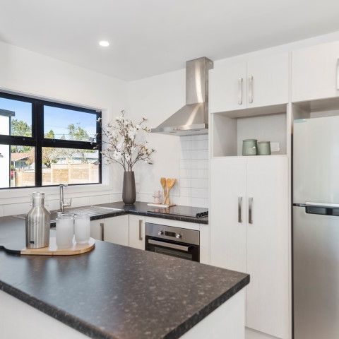These exceptional two-bedroom units in Glenview are nestled within a secured gated community, featuring an automatic gate. - Photo 1