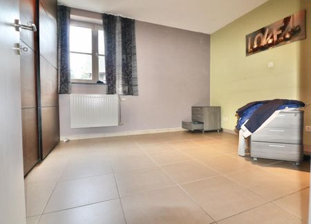 Ruime, energiezuinige woning met 2 slpk, garage, patio, tuin en terras voor 1.095 EUR/mnd - Photo 3