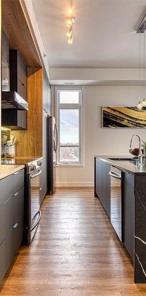 Penthouse 5 ½ adossé au golf de Saint-Lambert! 2 159 pi² - Photo 1