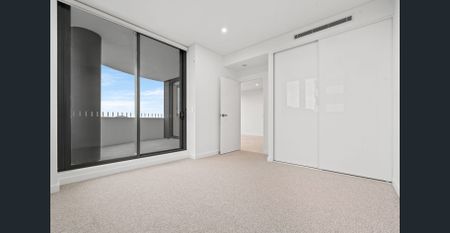 Luxury Living at the Archibald – Stunning Water & District Views - Photo 3