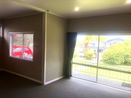 This is a well presented two bedroom home set on an easy care section with a fenced rear yard. - Photo 5