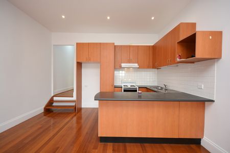 In the heart of it all and located above a shop – A Must-See! - Photo 4