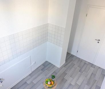 Schön gelegene 3-Raum-Wohnung mit Tageslichtbad - Foto 4