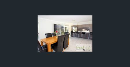 COMFORTABLE 5 BEDROOM HOME WITH SO MUCH TO OFFER - Photo 2