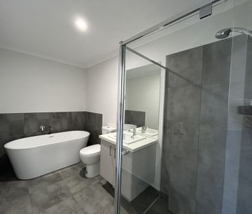 FOUR BEDROOM HOME - LOW MAINTENANCE! - Photo 1