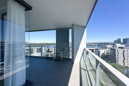 Luxury Apartment with Spectacular Water Views | Top Floor of Complex - Photo 2