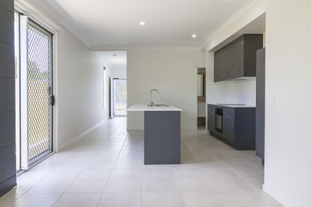 MODERN, STYLISH, AND READY TO ENJOY - WELCOME HOME TO 27 QUEST LANE! - Photo 2