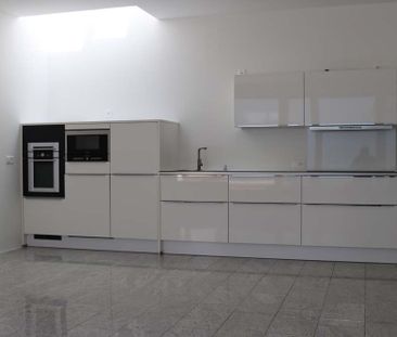 Moderne 3.5-Zimmerwohnung mit privatem Innenhof und Top-Ausstattung... - Photo 3