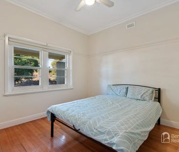 COMFORTABLE TWO-BEDROOM HOME WITH VERSATILE RUMPUS ROOM - Photo 3