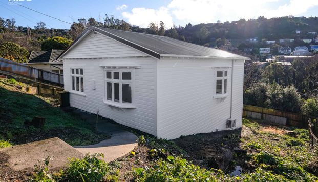 Renovated Three Bedroom Home - Photo 1