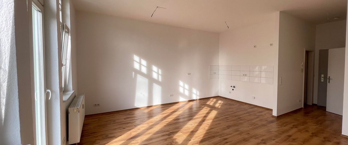 Stadtnahes Wohnen: Einzimmerapartment mit Balkon - Foto 1