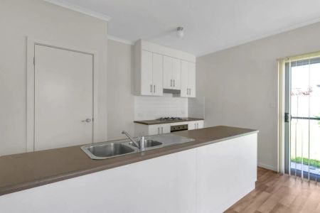 Fresh, Modern & Low-Maintenance Living in a Prime Location - Photo 4