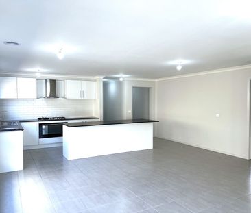 Modern Four Bedroom Home With Plenty of Room ! - Photo 6