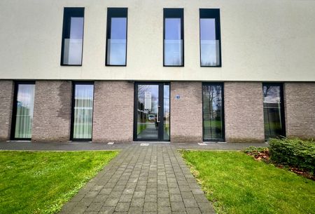 Nieuwbouwappartement met drie slaapkamers en gezellig terras vlakbij het centrum van Lanaken! - Photo 3