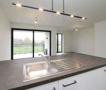 Nieuwbouwapp. met twee slpk, zuidterras op een gunstige ligging te ... - Foto 2