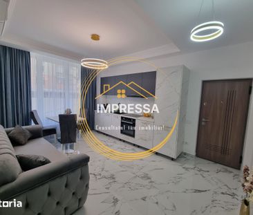 Se inchiriaza apartament 2 camere mobilat si utilat complet 400e - Photo 2
