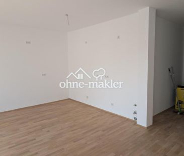 Neubauwohnung exklusiv - Erstbezug mit Balkon, Tiefgarage und Keller - Photo 4