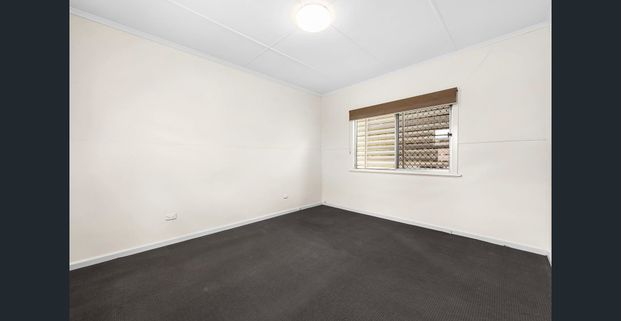 Tidy Home With Large Backyard! - Photo 1