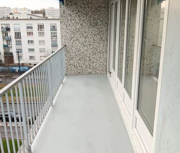 APPARTEMENT 3 PIECES 60.53 M² AVEC CAVE ET PARKING EN SOUS-SOL - Photo 2