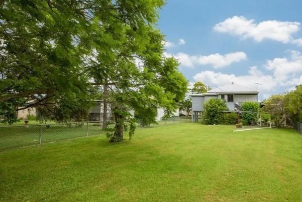 Light-Filled Queenslander Living Just Steps from Redbank Station - Photo 1