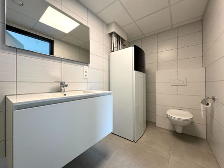 Modern 1-slaapkamerappartement met staanplaats te huur in Maasmechelen - Photo 3