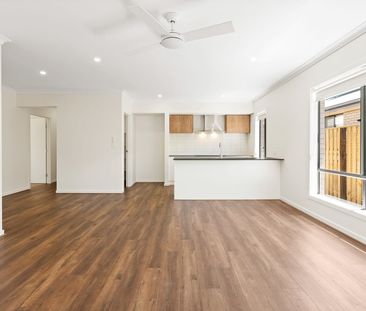 Modern Four-Bedroom Family Home with Separate Media Room - Photo 3