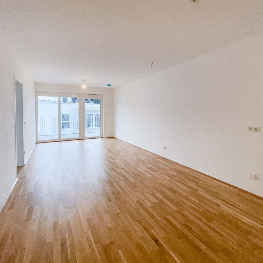 Geförderte 2-Zimmer-Wohnung mit Tiefgaragenparkplatz und Balkon in Gallspach. Erstbezug! - Foto 1