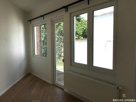 Gelijkvloers appartement met tuin en garage - Photo 3