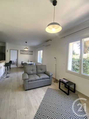 Appartement T2 à louer 2 pièces - 48,20 m2 CHATEAUNEUF LES MARTIGUES - 13 - Photo 1