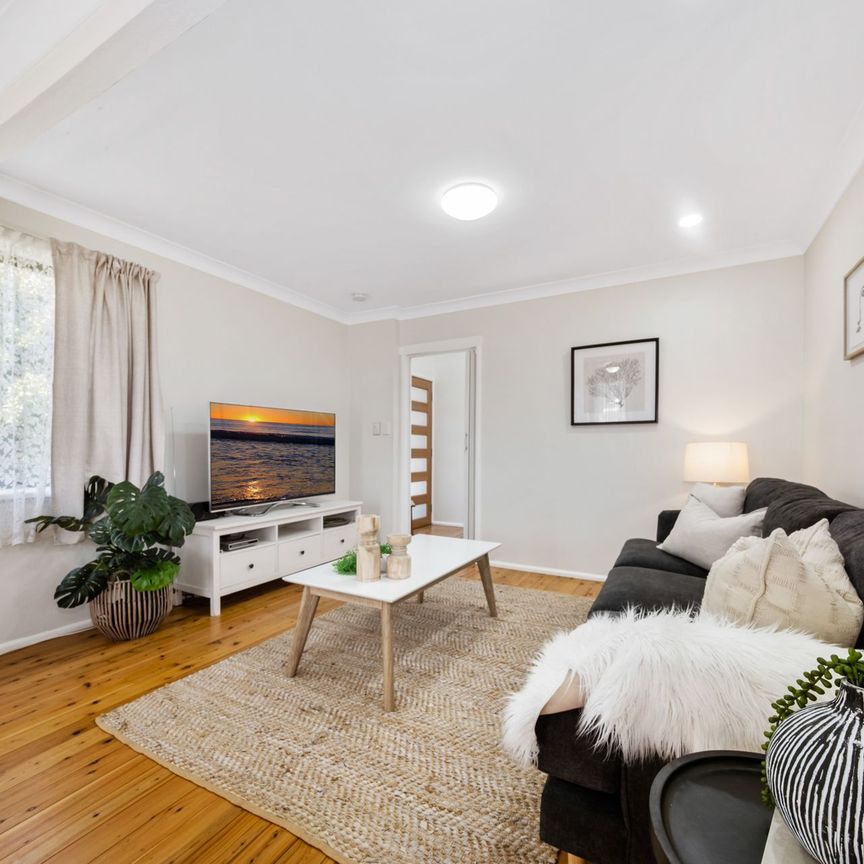 Elevated Family Home in Great Location - Photo 1