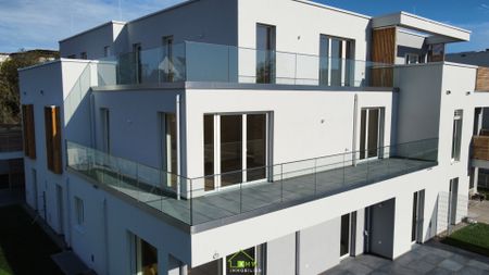 Exklusive Erstbezug-Wohnung mit Balkon und 2 Garagen - modernes Design und hochwertige Ausstattung - Foto 3