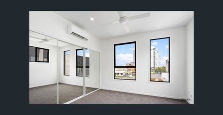 MODERN THREE LEVEL TOWNHOUSE WITH POOL IN GREAT LOCATION! - Photo 2