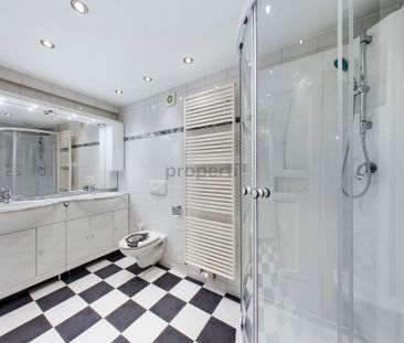 Centrally located duplex apartment with a fireplace ideal for coupl... - Photo 5