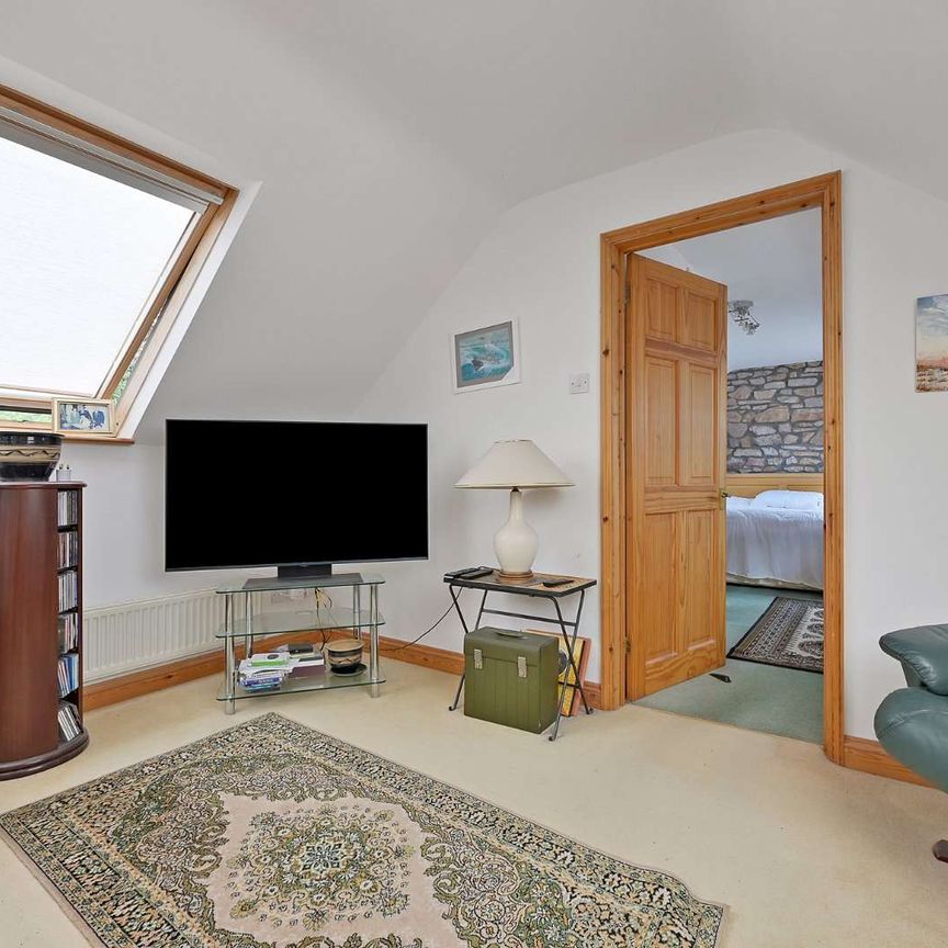 A beautifully presented, fully furnished two-bedroom top-floor apartment, combining character, contemporary loft-style living and exceptional proportions, with stunning views to the rear. - Photo 1