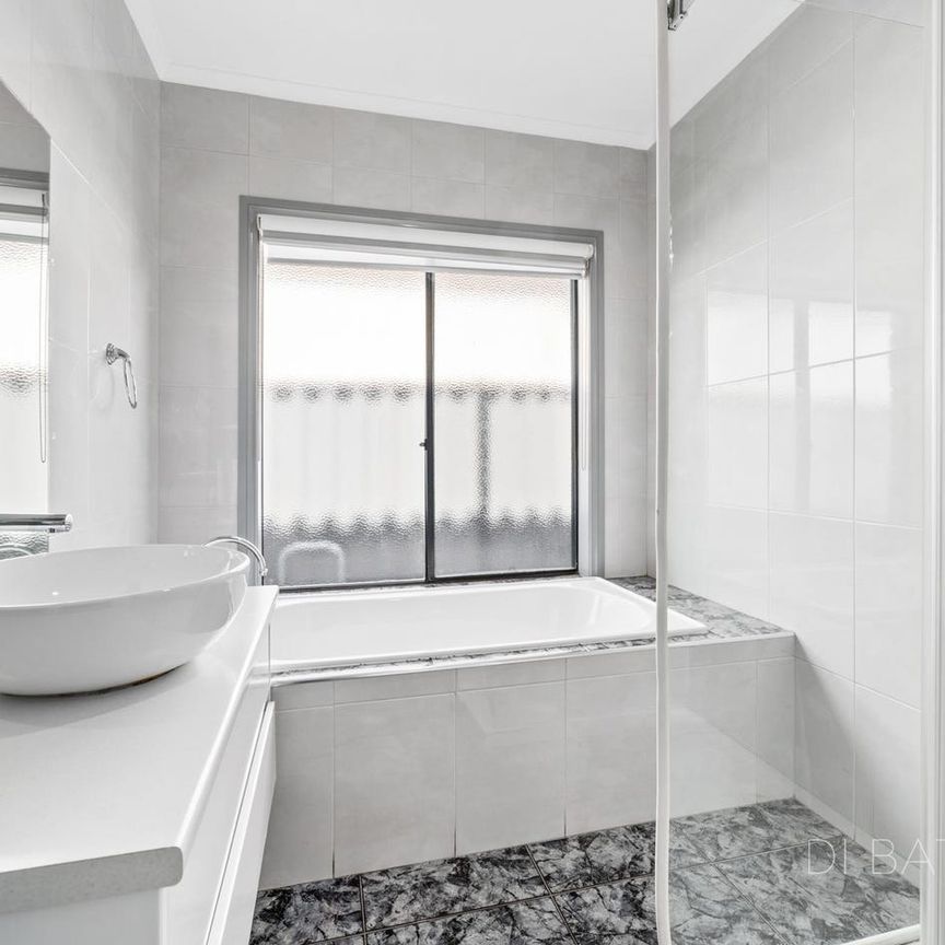 Stunning Family Home in Roxburgh Park with Multiple Living - Photo 1