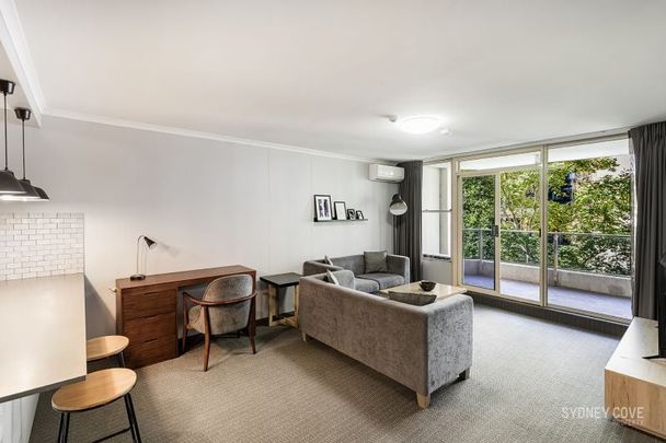 Large Updated Two Bedroom | Furnished - Photo 1