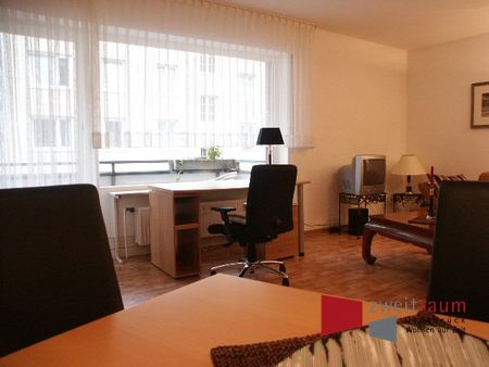 Wüste, zentrale 2-ZKB-Wohnung mit Balkon und PKW-Stellplatz, fußnah zur Innenstadt. - Foto 2