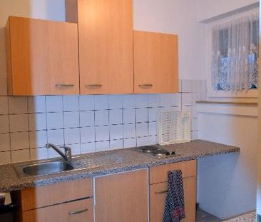 Möbliertes Single-Apartment mit Balkon und Tiefgaragenplatz - Photo 2