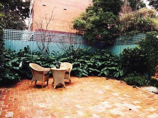 DELIGHTFUL 3 BEDROOM BRICK HOME WITH OFF STREET PARKING FOR 1-2 CARS - Photo 1