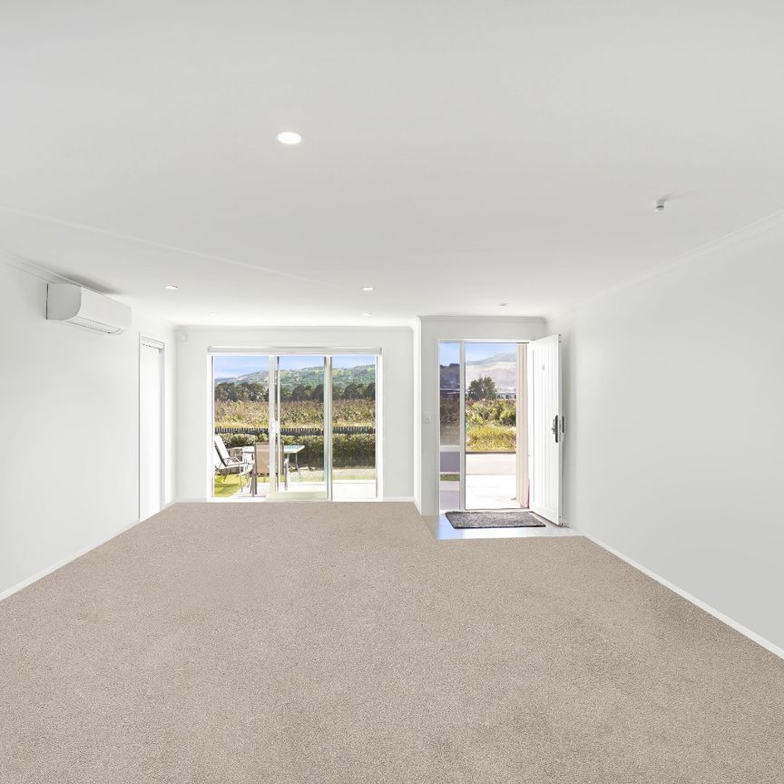 Modern Family Living in the Heart of Ramarama - Photo 1