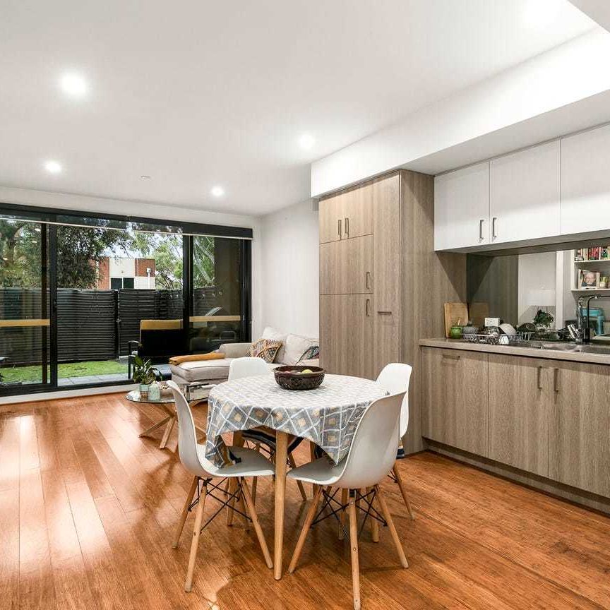 Modern One-Bedroom Apartment with Private Backyard - Photo 1