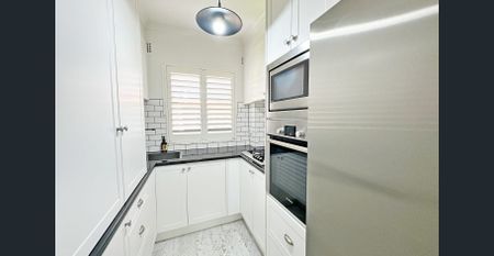 GREAT ONE BED RIGHT IN THE VILLAGE - Photo 2