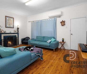 Central Home Packed with Positives! - Photo 1