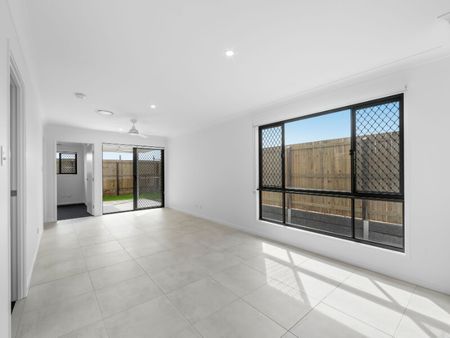 Brand New Family Home with Ducted Air Conditioning, Solar & Stylish Modern Finishes - Photo 2