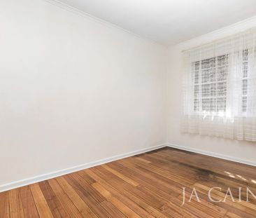 Charming 3-Bedroom brick home - Photo 2