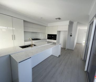 MODERN HOME IN UP AND COMING AREA! - Photo 2