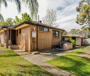 Charming Three-Bedroom Home - Photo 1