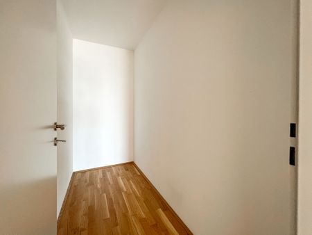 Helle DG-Wohnung mit großer Terrasse im Viola Park - Photo 4