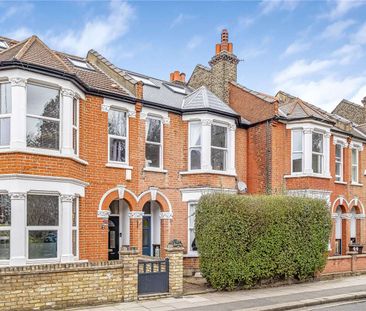 A lovely four bedroom family home in the heart of Wimbledon. - Photo 1